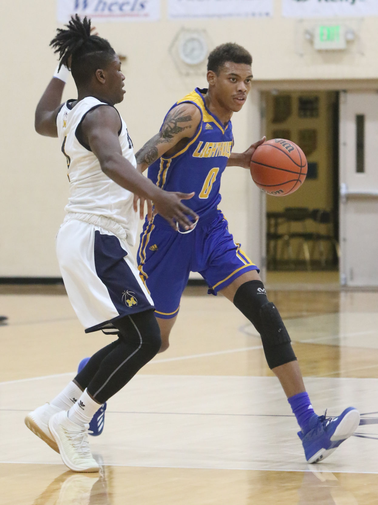 Lighthouse at Marquette Catholic boys basketball